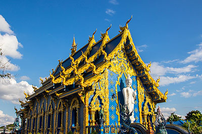 Wat Rong Suea Ten, the Blue Temple of Chiang Rai