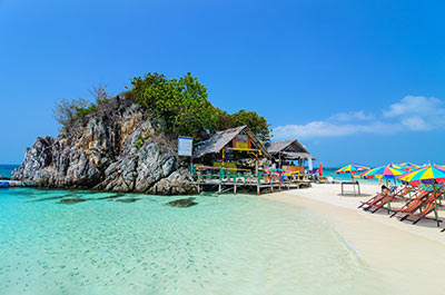 A small beach and crystal clear waters at Khai Island