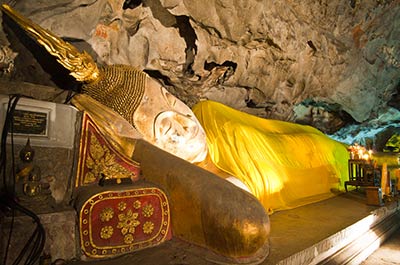 A Reclining Buddha inside the Khao Luang cave in Phetchaburi