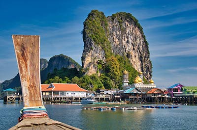 A boat approaching Koh Panyi, a small fishermen village built on stilts in the sea