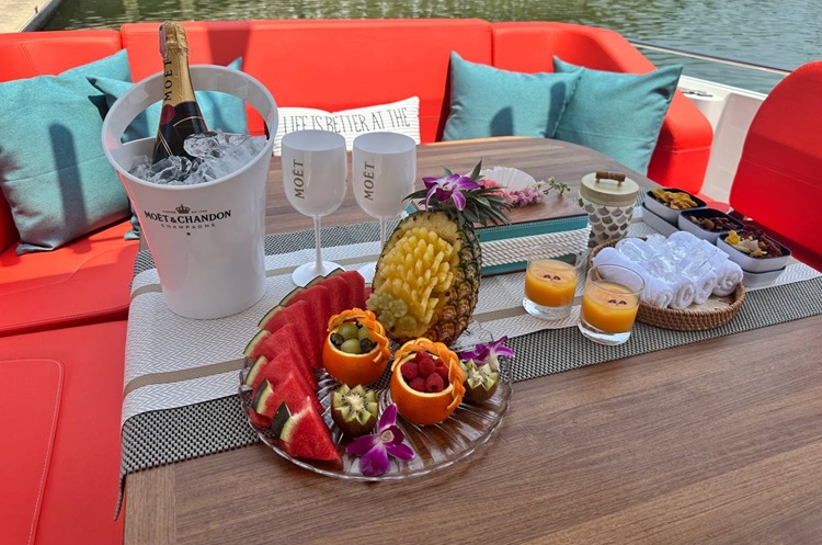 Fresh fruits, gourmet snacks and cold champagne